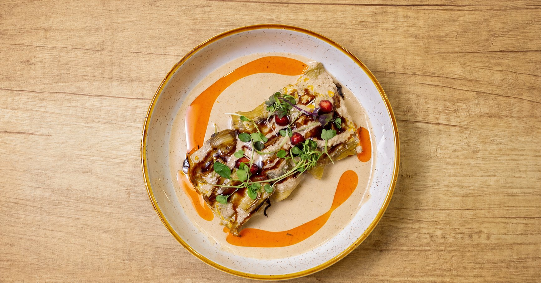 Eggplant rolls with walnut paste and pomegranate