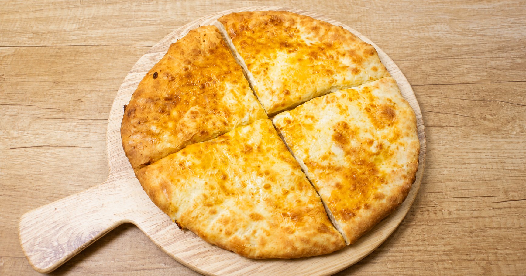 Imeruli khachapuri — round cheese-filled bread