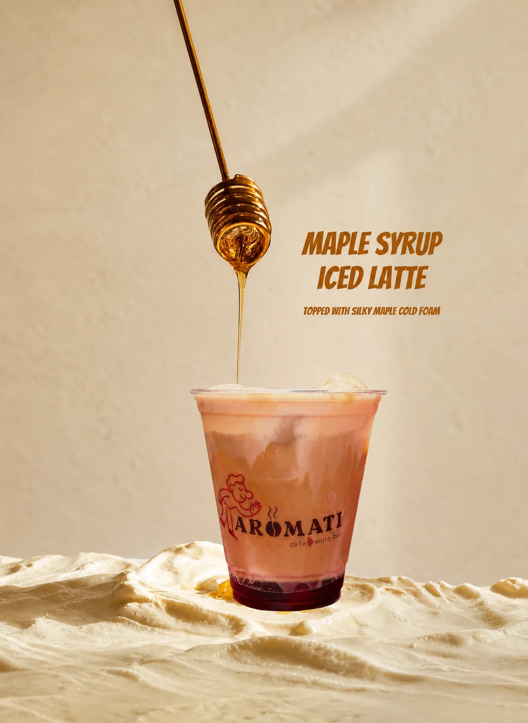 Maple syrup iced latte with cold foam